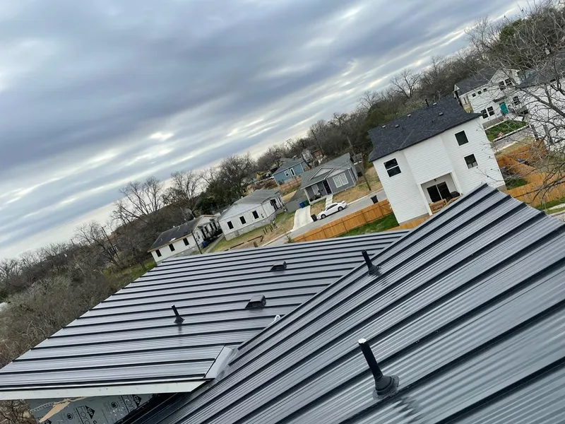 Standing seam metal roof panels with vents for Skylight Repair in Fort Morgan